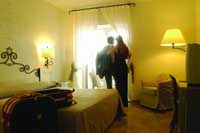 Classic single with garden view, balcony, private facilities (bath and shower), and breakfast